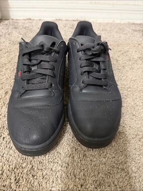 Adidas Men's Black Low-Top Sneakers with Subtle Red & Green Detail